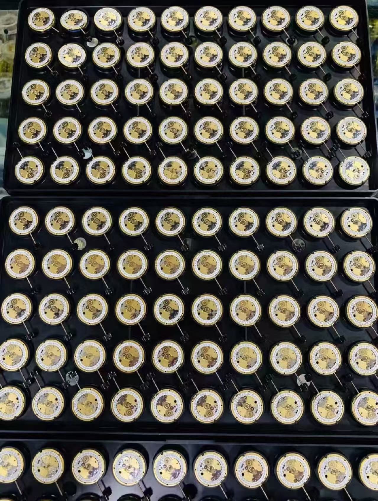 Detailed view of decorated and finished Swiss ETA movement with custom rotors and engraving