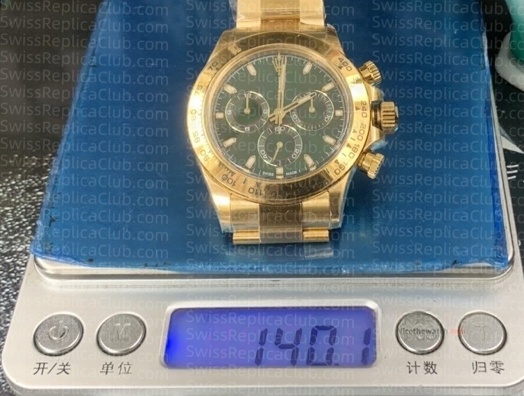 Weight measurement of Clean Factory Rolex Daytona super clone on digital scale showing authentic watch mass